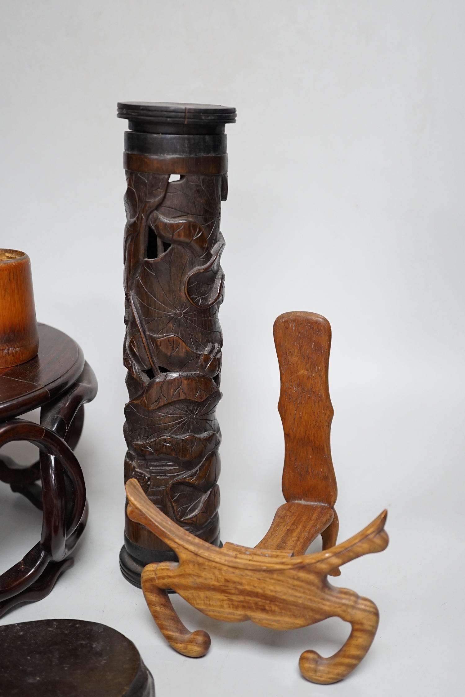 A group of Chinese wood stands and a perfume holder